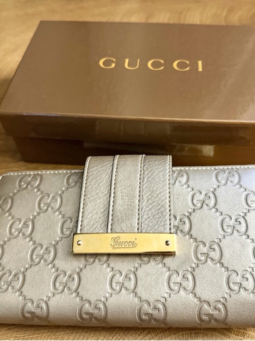 Gucci Metallic Silver GG Embossed Leather Wallet